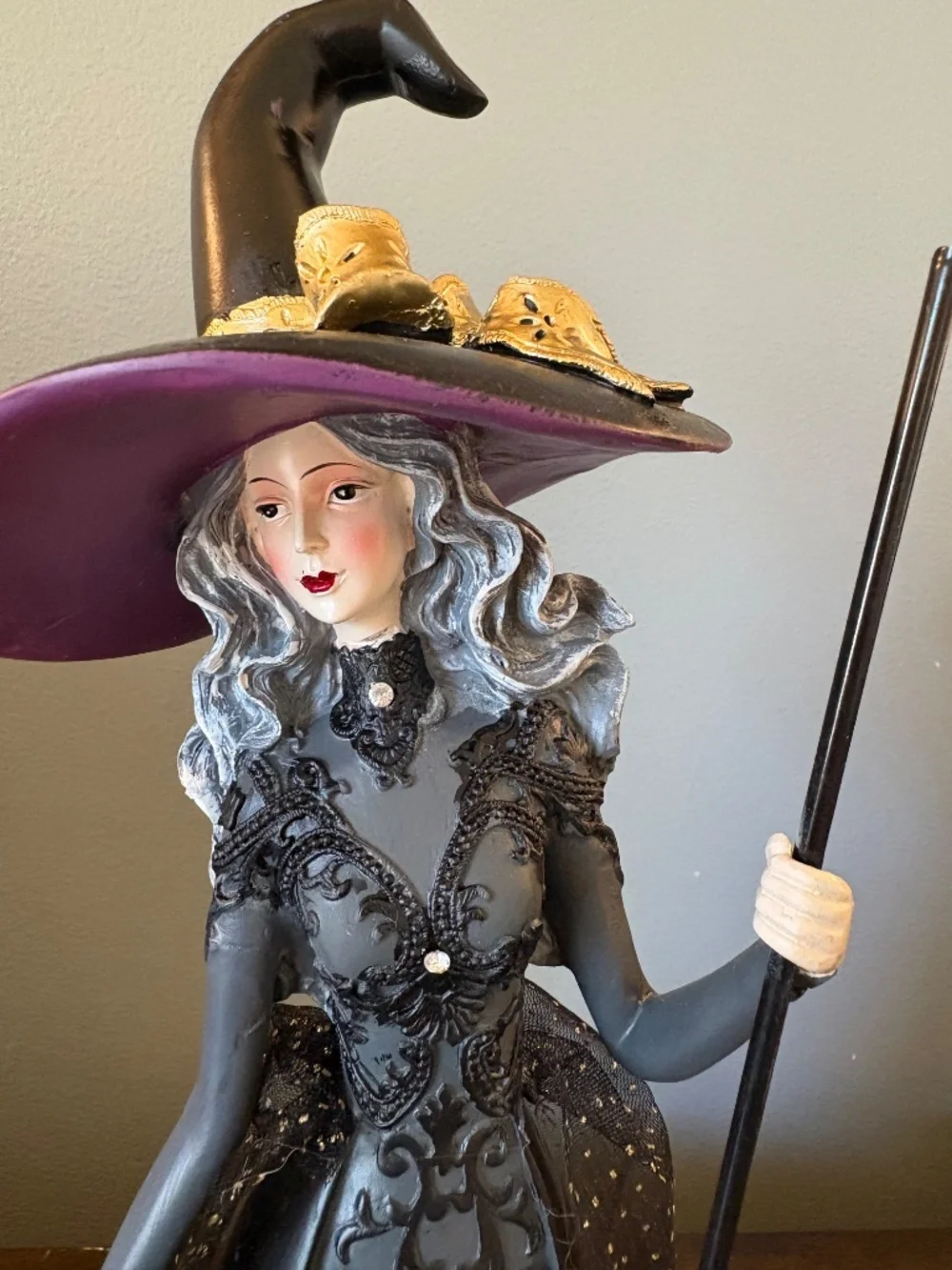 Elegant Black Witch Figurine with Purple Hat - Home Accents